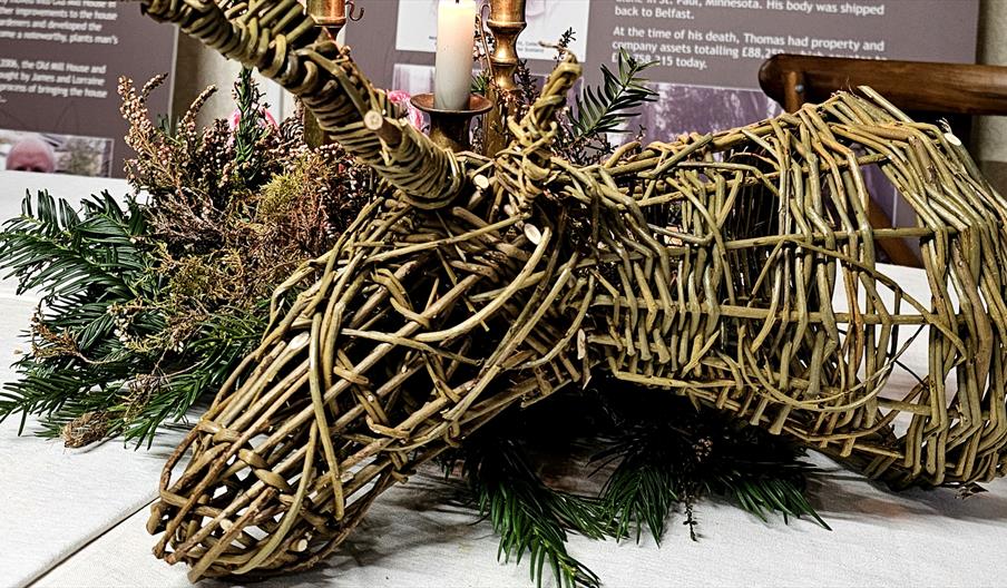 willow stags heads on trestle table