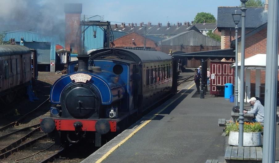 Blue steam engine and platform