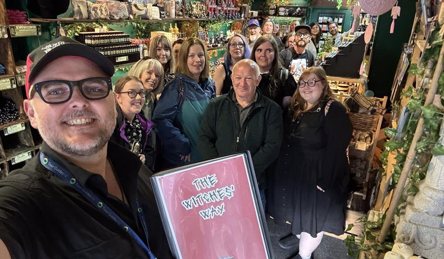 A tour group attending The Witches' Way - full-day historical witchcraft coach tour from Belfast by Alternative Ulstours