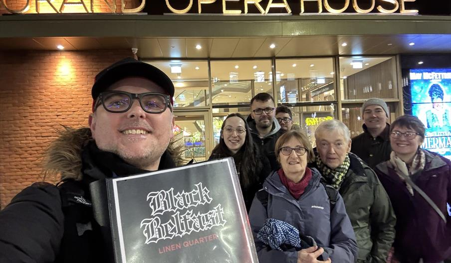 A tour group attending Black Belfast: Linen Quarter - horror & true crime walking tour by Alternative Ulstours