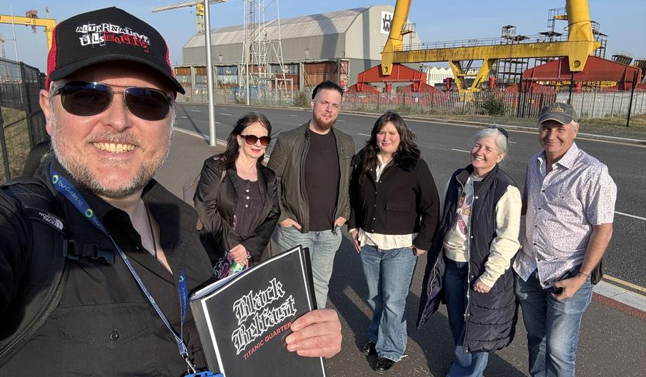 A tour group attending Black Belfast: Titanic Quarter - horror & true crime walking tour by Alternative Ulstours