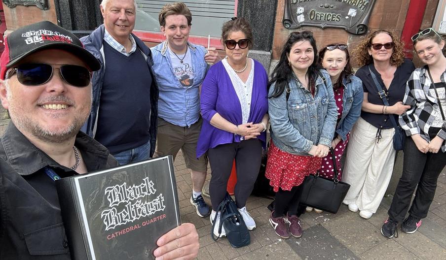 A tour group attending Black Belfast: Cathedral Quarter - horror & true crime walking tour by Alternative Ulstours