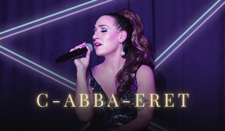 Rosie Barry on stage singing