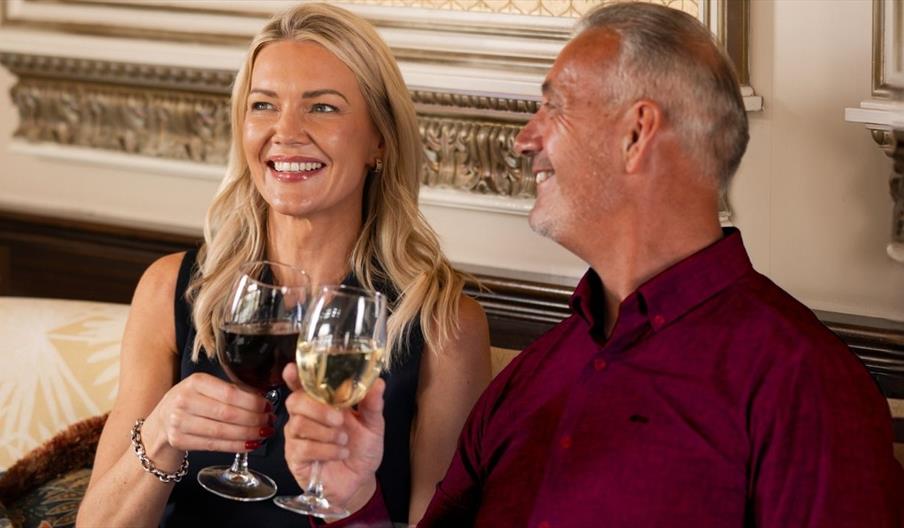 Couple enjoying a glass of wine