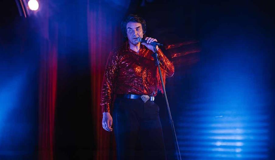 Michael Clews as Elvis