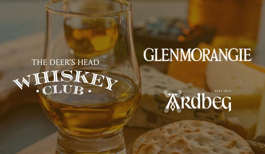 whiskey glass and whiskey and crackers