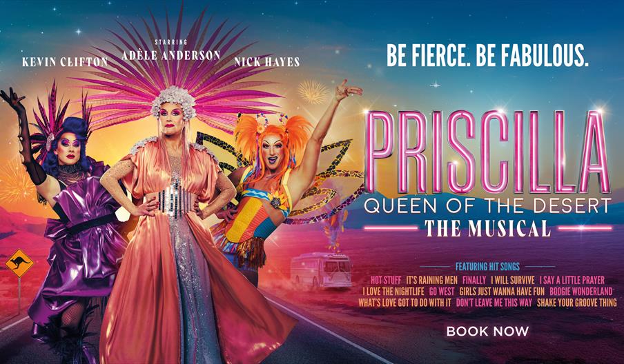 "Colourful poster for 'Priscilla Queen of the Desert: The Musical' with three drag performers in vibrant costumes against a sunset desert backdrop. Te