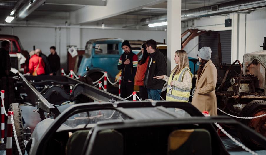 People looking at cars in the Transport Museum Store