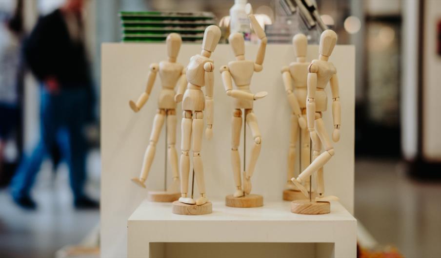 Five wooden art figurines