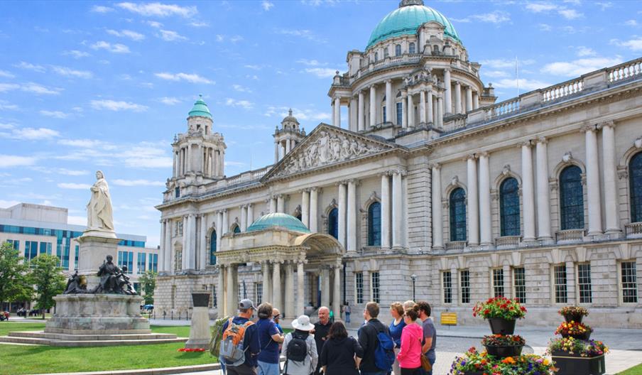 A History of Terror tour group outside Belfast City Hall