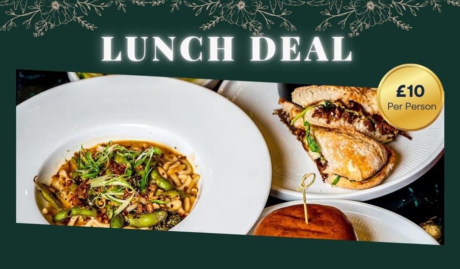 dark green background with photo of plated food with text lunch deal £10 per person