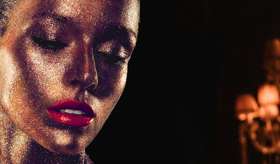 woman with glitter face