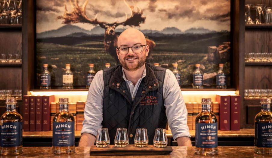 Chefs preparing food for a whiskey pairing at Belfast Whiskey Week