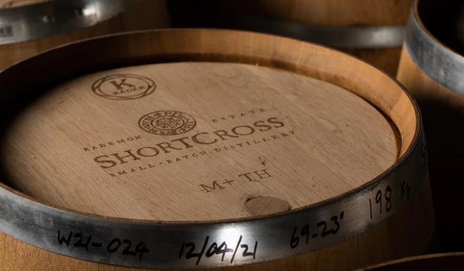 A distiller sharing whiskey stories with guests at Belfast Whiskey Week