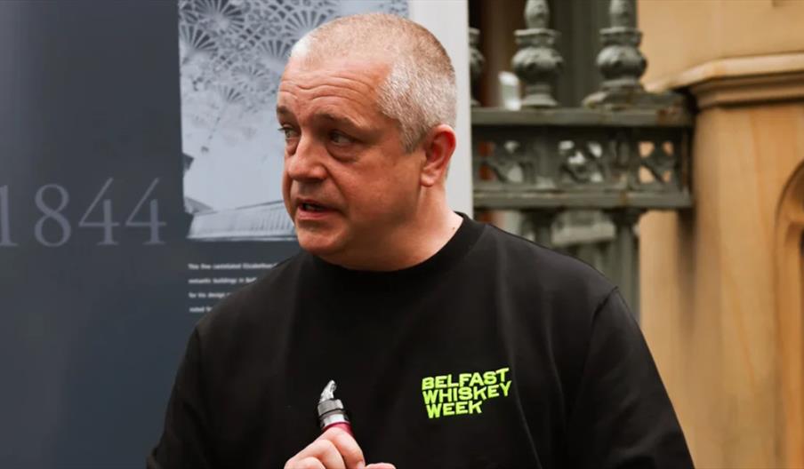 Friends tasting Irish whiskey together at Belfast Whiskey Week