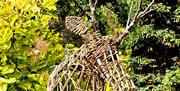 willow stags head hanging in the garden