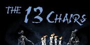 Cartoon image of long table with chair with skull. Thirteen chairs on title