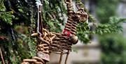 willow reindeers handing from a tree
