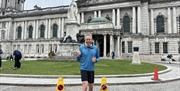 Image of Simon outside city hall